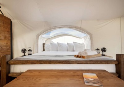 View of Bed in Stargazer Tent at Under Canvas Grand Canyon