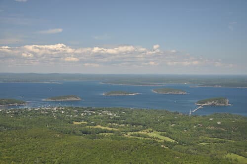 water front with green hiking trail