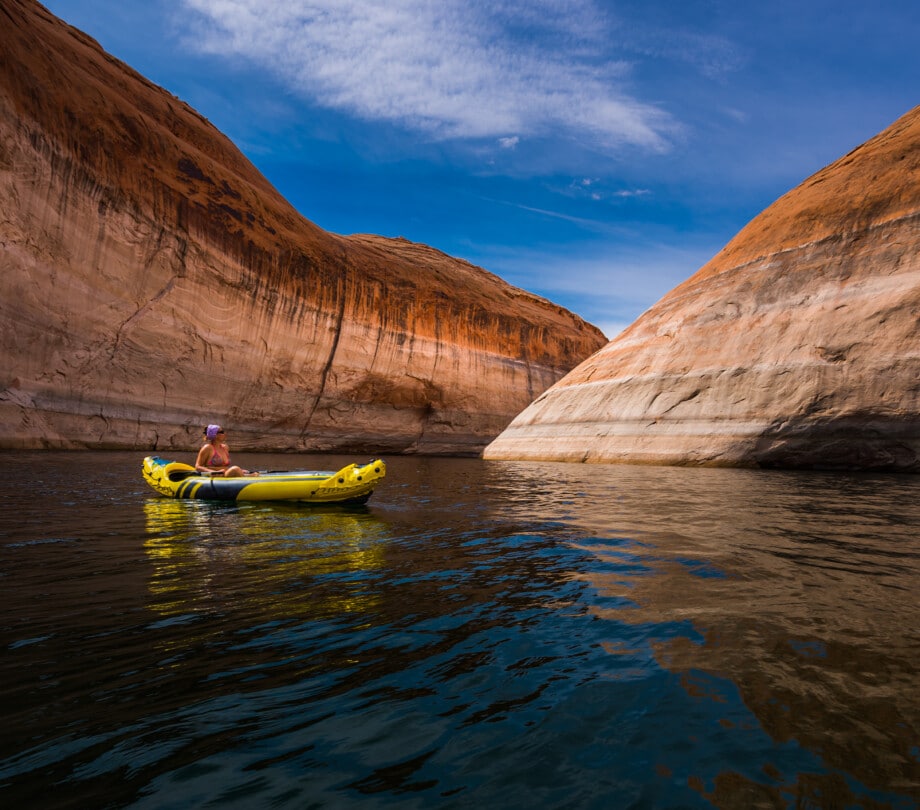 Woman Kayaking on lake powell