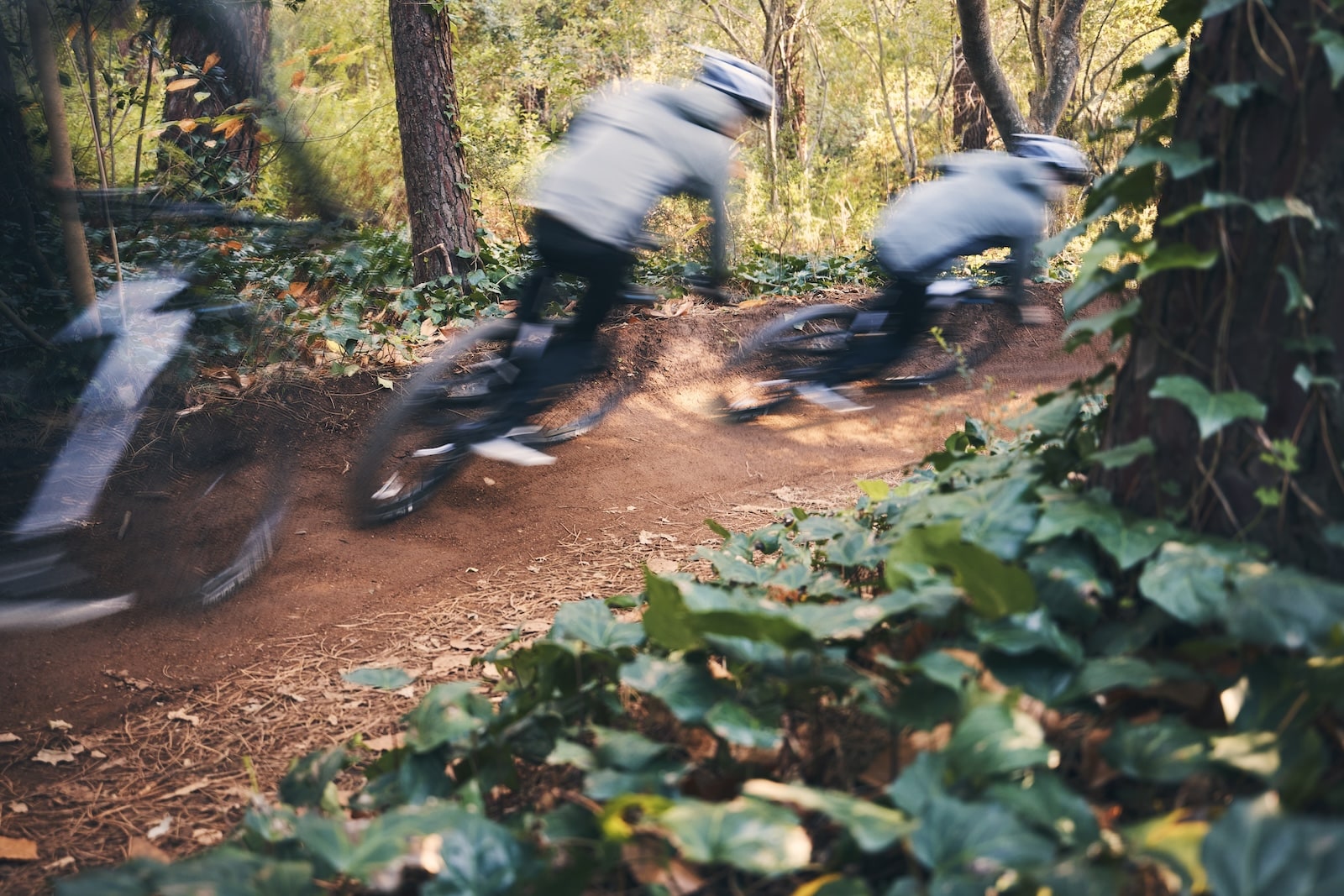 Mountain biker riding a berm.
