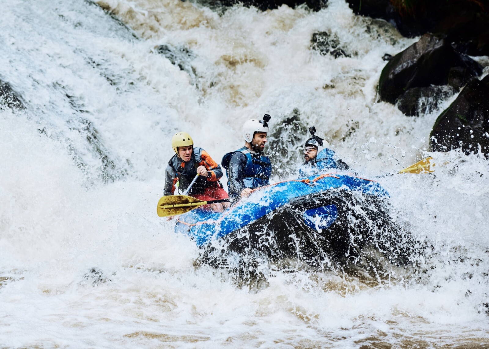 Rafters going through an intense rapid on the White Salmon River.