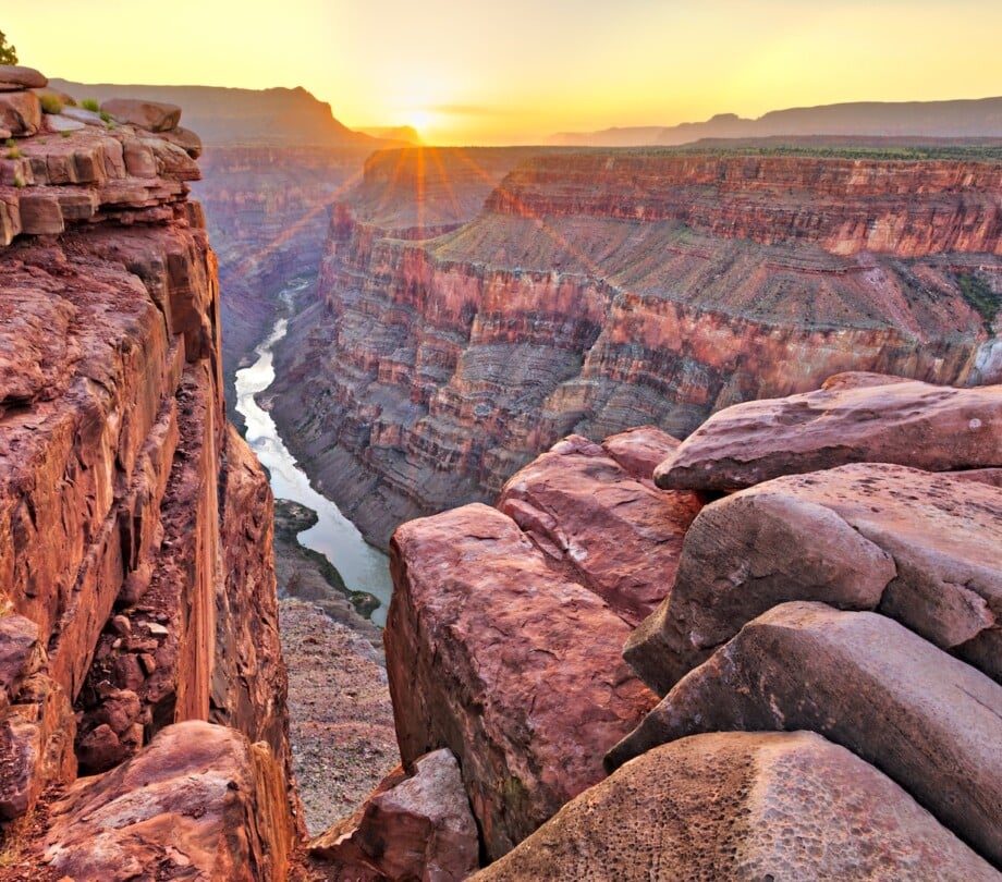 View of the Colorado River in the Grand Canyon during sunset.