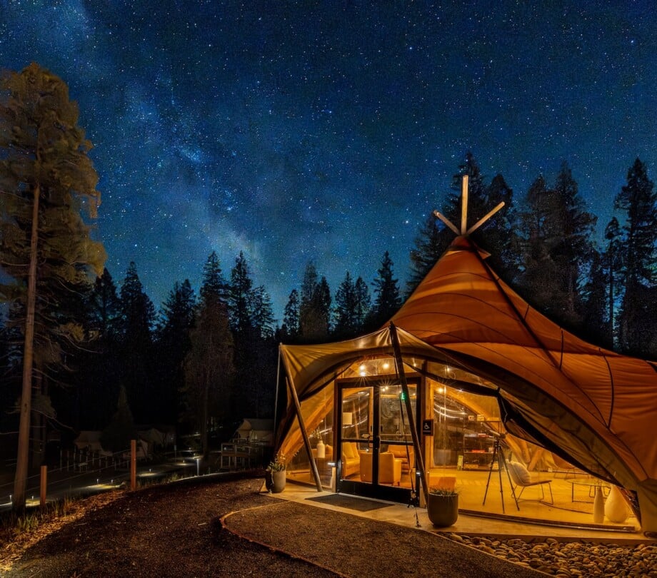 Under Canvas Yosemite lobby tent under the night sky.